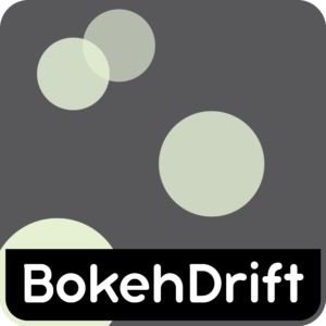 Soft drifting bokeh particles layered over animated gradients for subtle atmospheric motion.